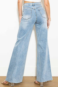 CRISS-CROSS high waisted wide leg raw hem jeans