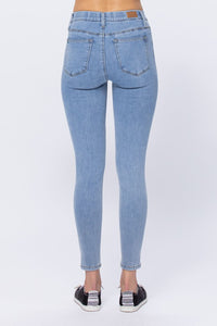Mid-Rise stretch denim jeggings ankle+distressed